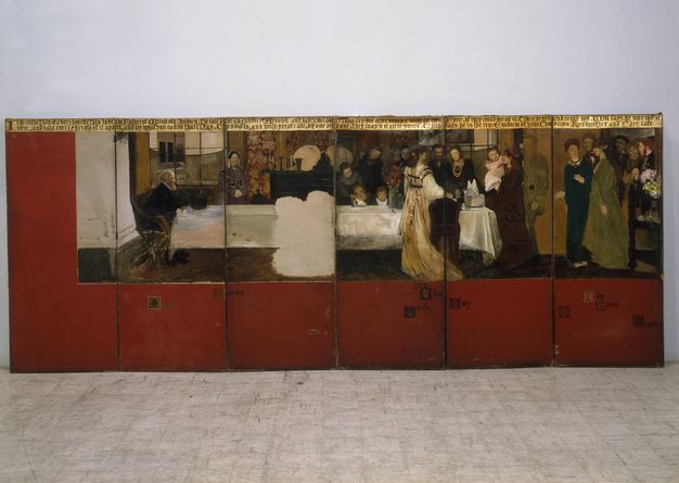 Painted screen. A banquet scene with about twenty pale-skinned women, men, and children spans six wooden panels. In the painting, a grey-haired man sits at the left end of a long table covered in a shiny white tablecloth. Others stand or sit at the table, mostly clustered around the other end. More enter the room from a doorway to our right. The women wear long gowns, and the men wear suits. The painting starts halfway through the first panel to our left, and covers the top two thirds of the panels, which otherwise have a rich brick red background colour.