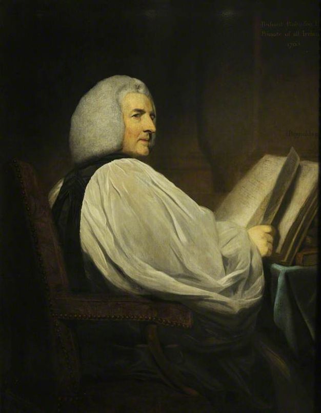 Painting. Shown from the lap up, a pale-skinned man sits with his body facing away from us to our right. He turns his head to look off to our right under dark brows. He has puffy white hair and a sharp nose. He holds a book open in front of him. The white sleeve we see covers most of his body.