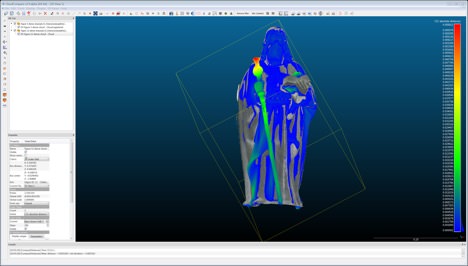 Screenshot. In this digital image, a sculpture of a man with long hair wearing long robes is superimposed on another almost identical sculpture. In each sculpture, the man holds something in each hand. A coloured depth map, using a spectrum from bright red to cobalt blue, overlays the original colour of the sculptures and indicates the range of differences between the two.