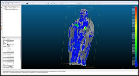 Screenshot. In this digital image, a sculpture of a man with curly hair wearing long robes is superimposed on another almost identical sculpture. In each sculpture, the man holds something in each hand. A coloured depth map, using a spectrum from bright red to cobalt blue, overlays the original colour of the sculptures and indicates the range of differences between the two.