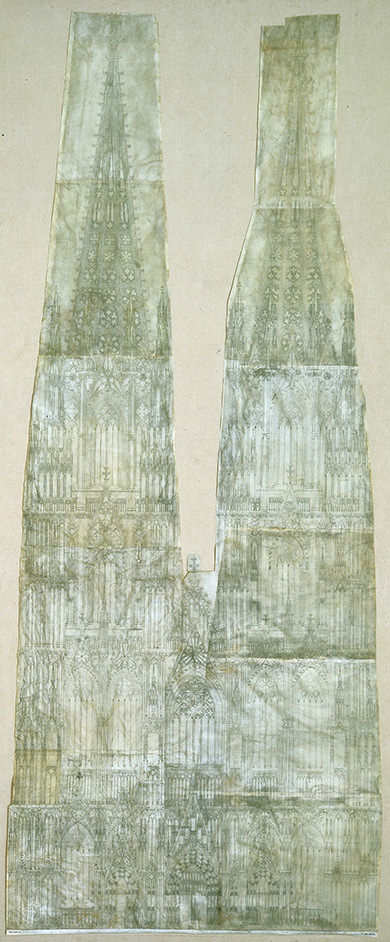 Drawing. Pieces of paper are combined to reconstruct an architectural drawing of the façade and towers of a church. The towers are so tall that at first glance the drawing looks like a pair of upside-down trousers.