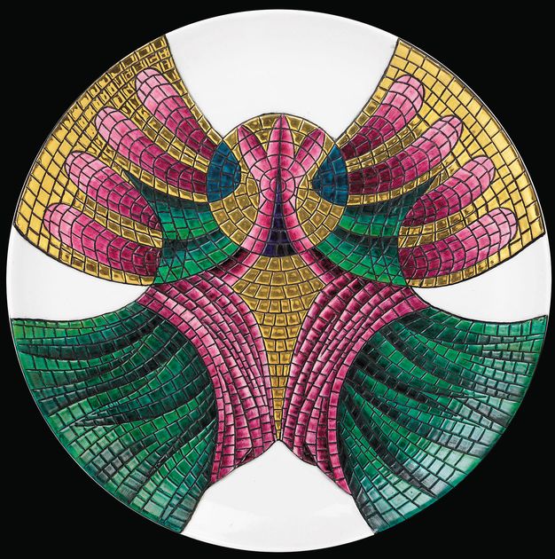 Plate. A painted pattern of glimmering gold, magenta, lapis blue, emerald, and grass green resembles a mosaic. Four bands swoop out from a central round, halo-like disc creating a wide X-shape.