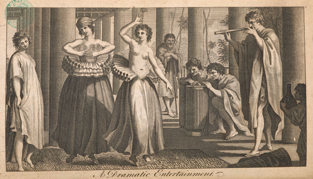 Print. Two women dance as two men play drums and a third man plays a pipe. Both women wear voluminous ruffs around their waists over long, full skirts and bare feet. One woman wears a turban and a gauzy material over her breasts. The other is bare-headed and bare-chested.