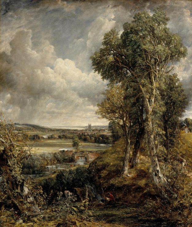 Painting. A small group of tall trees to our right frames a view into a wide, flat landscape. A river snakes through the landscape from the lower left corner, past the trees and on to a church tower in the distance. The horizon comes about halfway up the composition, and white clouds screen a slate-blue sky above.