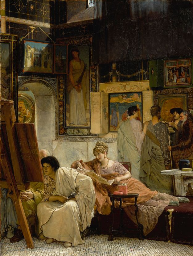 Painting. Two people sit as a woman reclines on a couch, legs to one side, while they inspect a panel painting on an easel. Four more men stand in a group at the back of the shallow room. The people have pale skin and all wear voluminously draped robes. Pictures hang on the walls above and around an arched doorway, to our left.