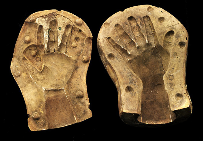 Plaster mould. Two halves of a mould could be used create a plaster case of a child’s splayed hand.
