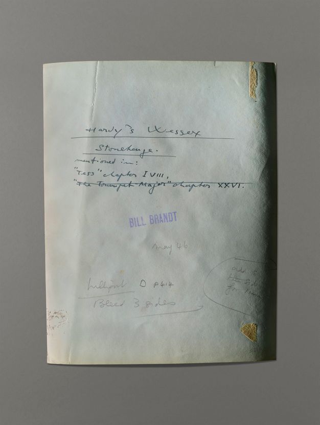 The back of a photograph has handwritten notes in pen and pencil. A stamp reads “Bill Brandt”.
