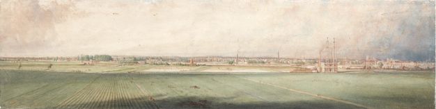 Watercolour. Green fields stretch back to a town lining the horizon of this long composition. The horizon comes about halfway up this painting, and the sky above is mottled with white, rosy beige, and smoky blue.