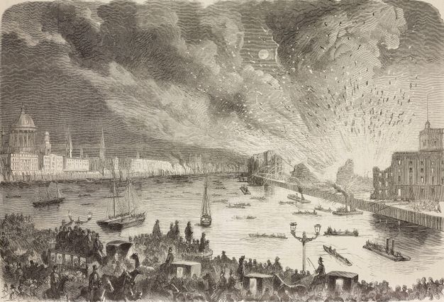 Print. Huge crowds of people gathered on a bridge along the bottom edge of this engraving are backlit by an explosion of light farther down the riverbank, to our right.