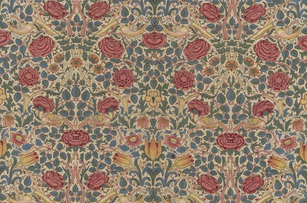 Textile. Deep pink and red, stylized roses are arranged in roughly hourglass-shaped lines against a web of pink and yellow stems, peach-coloured flowers, yellow tulips, birds, and blue and green leaves against an ivory-white background.